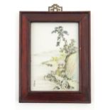A Chinese porcelain plaque decorated with a coastal scene. Character marks lower left. Approx. 9 1/
