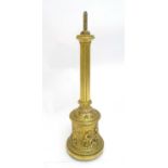 A 19thC Elkington & Co. gilt metal table lamp column, the base decorated with tavern and garden