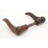 A pair of 20thC Bakelite lever door handles in mottled brown. Approx. 4 1/2" Please Note - we do not