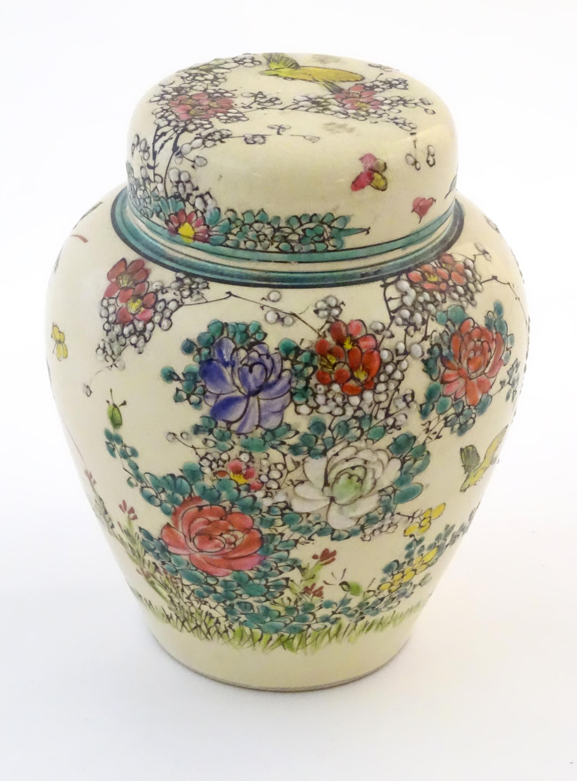 An Oriental ginger jar and cover with inner lid, decorated with flowers and foliage. Possibly - Image 3 of 13