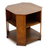 An Art Deco oak octagonal three tier table. 22 1/2" wide x 22 1/2" deep x 23" high. Please Note - we