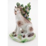 A Continental model of a dog with bocage, possibly Samson. Approx. 4 1/2" high Please Note - we do