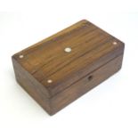 A late 19th / early 20thC walnut box with inlaid mother of pearl roundel detail to lid. Approx. 3