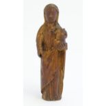 A 19thC Continental carved wooden model of mother and child, possible Madonna & Child. Approx. 5"