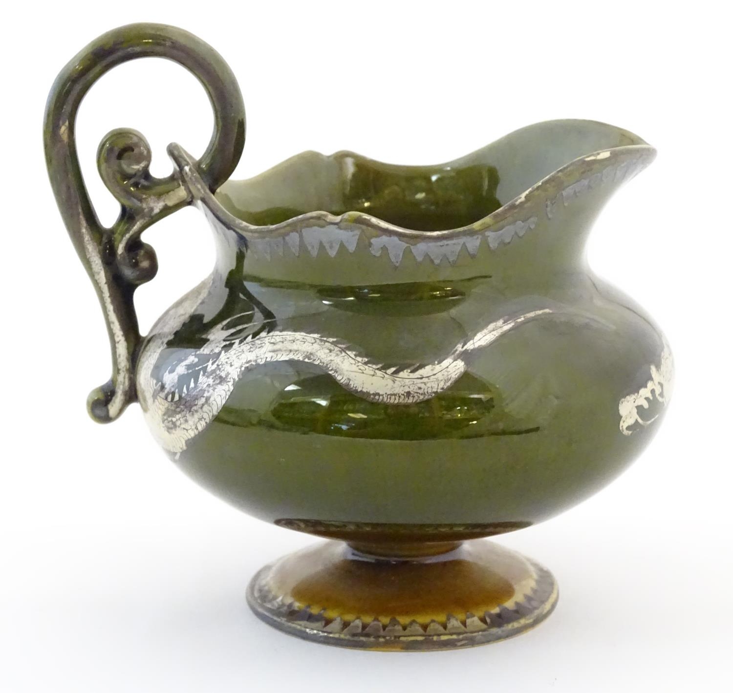 An Oriental pedestal cream jug with gilt dragon detail. Impressed marks under. Approx. 4" high - Image 4 of 7