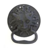 A 20thC cast door knocker with mask detail. Approx. 8 1/4" high Please Note - we do not make