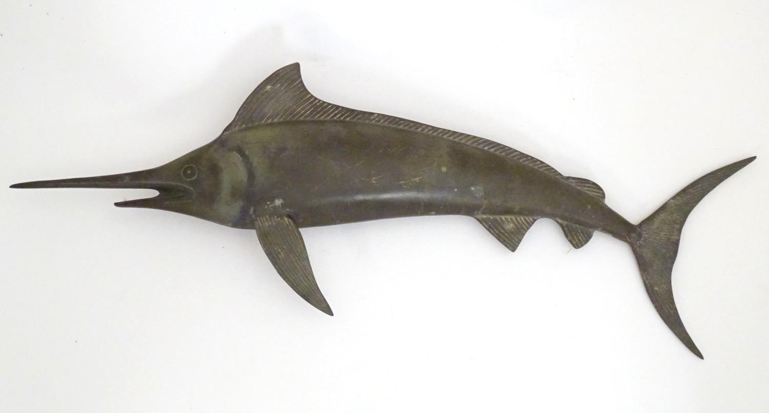 A 20thC cast bronze sculpture modelled as a swordfish. Approx. 19 1/2" long Please Note - we do