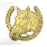 Equestrian, sporting collectables: a large brass decorative wall plaque formed as a horse head