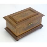 A 20thC Continental jewellery box of casket form with scroll detail to lid and fitted lift out