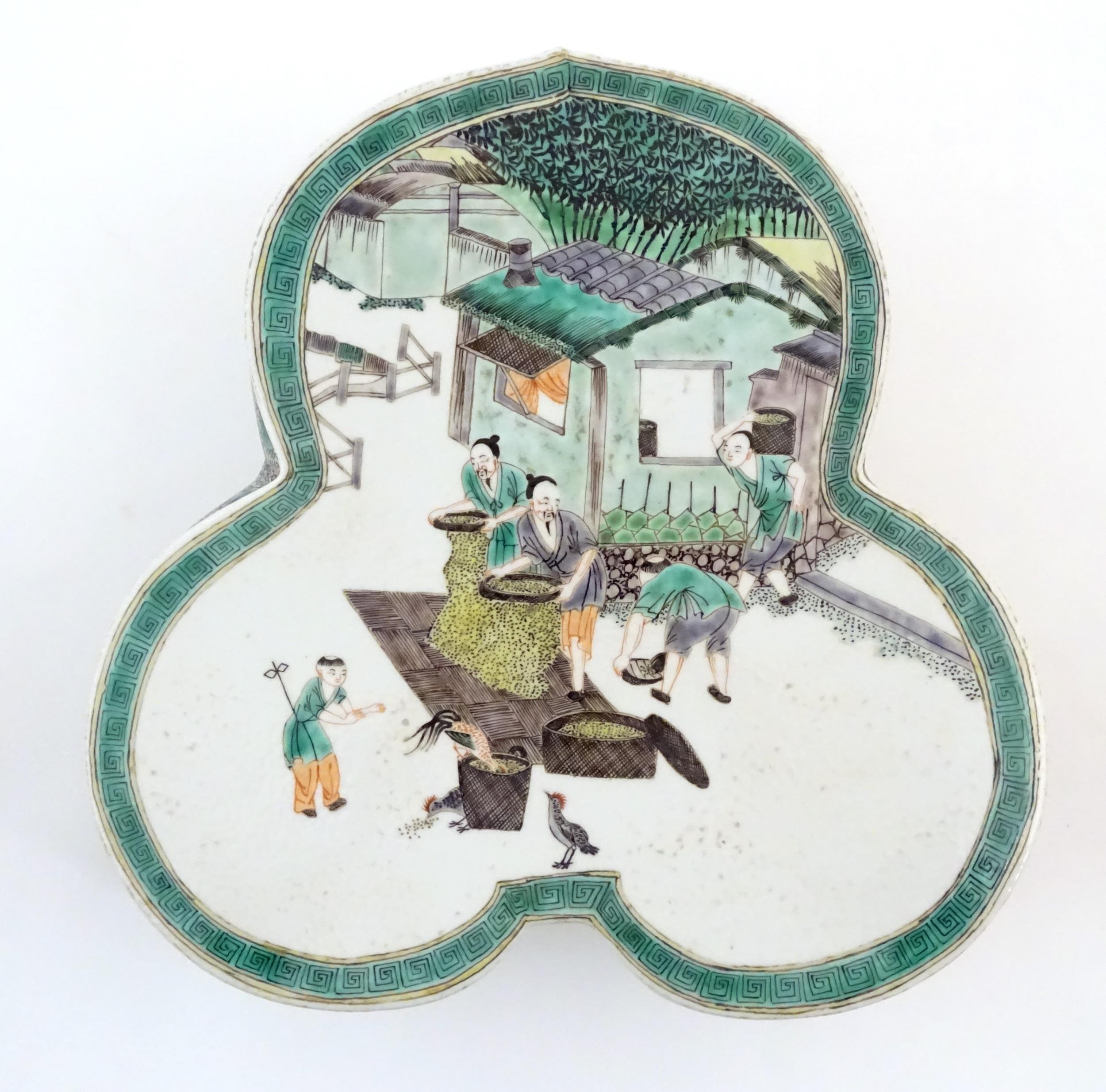 A Chinese famille verte stand of trefoil form depicting figures sifting grain and shooing - Image 4 of 9