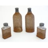 Four 20thC glass bottles / flasks with wicker covers. Largest approx. 10 3/4" high (4) Please Note -