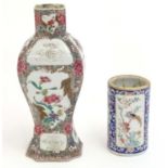 A Chinese vase with panelled peony and flower decoration. Together with a Chinese brush pot of