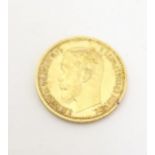 Coin: A 1902 Russian 5 ruble gold coin depicting Nicholas II and crowned double headed imperial