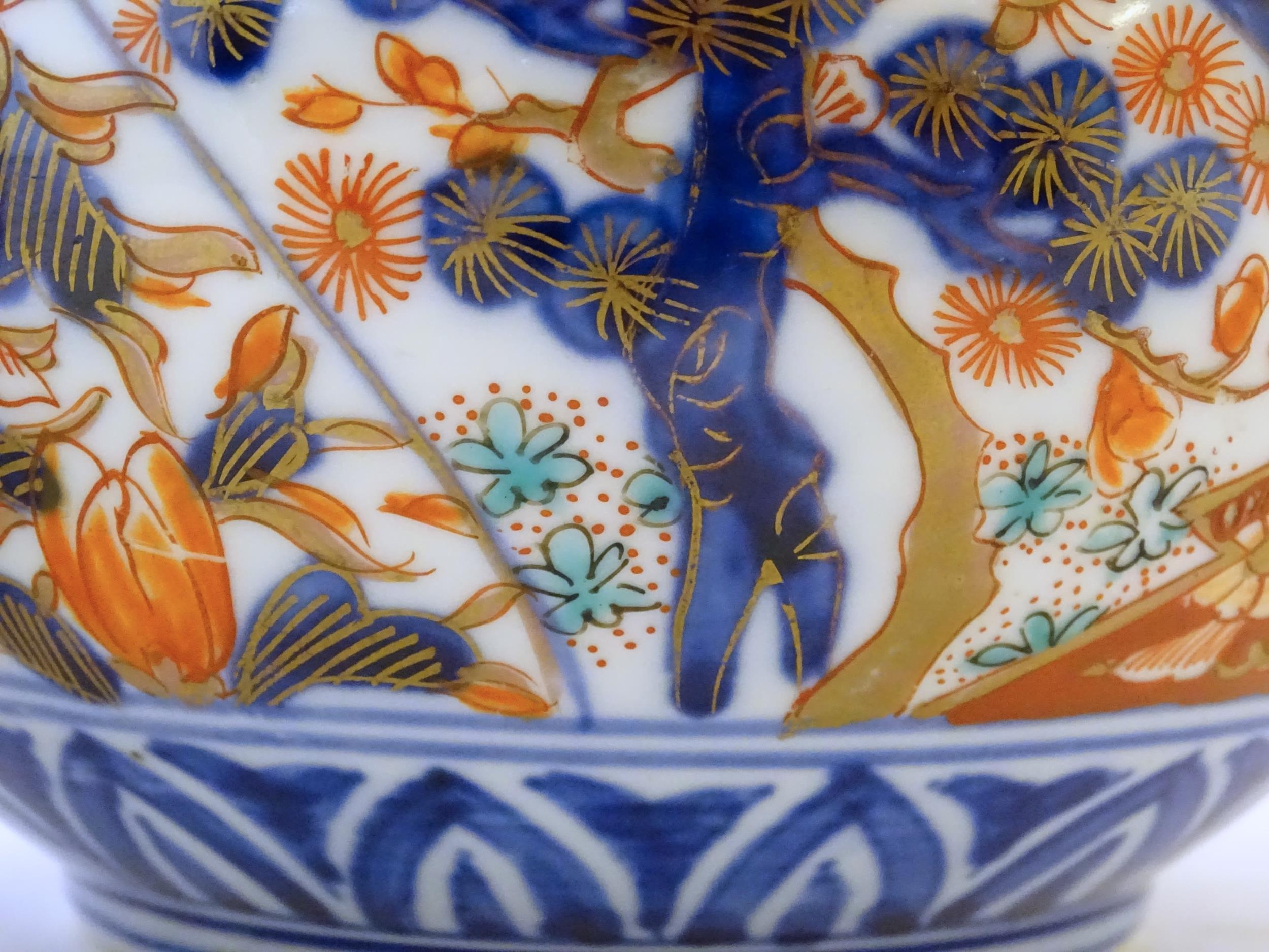 Two Oriental vases of bulbous form with flared rims decorated in the Imari palette with flowers - Image 8 of 8