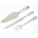 Three various silver handled items to include pie serve, bread fork and knife. Longest approx. 10"