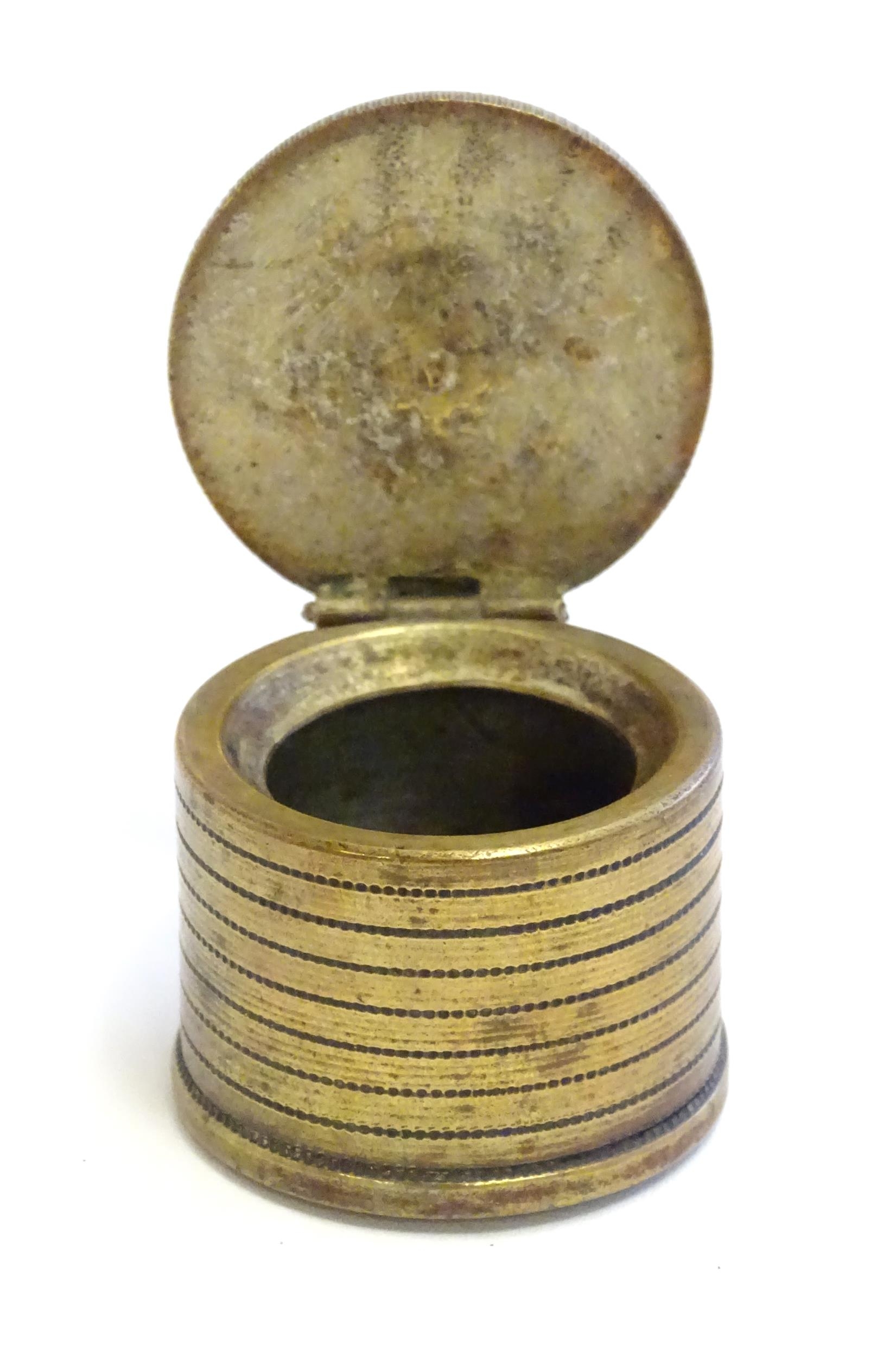 A 20thC Continental cast inkwell modelled as stacked coins, with applied French coins to top. - Image 7 of 9
