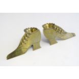 A pair of Victorian brass novelty posy holders formed as shoes. Approx. 2 1/2" high x 5 3/4" wide (