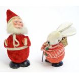 Two 20thC novelty chocolate boxes, modelled as the Easter bunny and Father Christmas. Largest