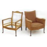 Two chairs for re - upholstery with turned wooden front legs terminating in pad feet and splayed
