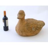 A late 19th / early 20thC large terracotta model of a seated duck. Approx. 13 1/2" high Please