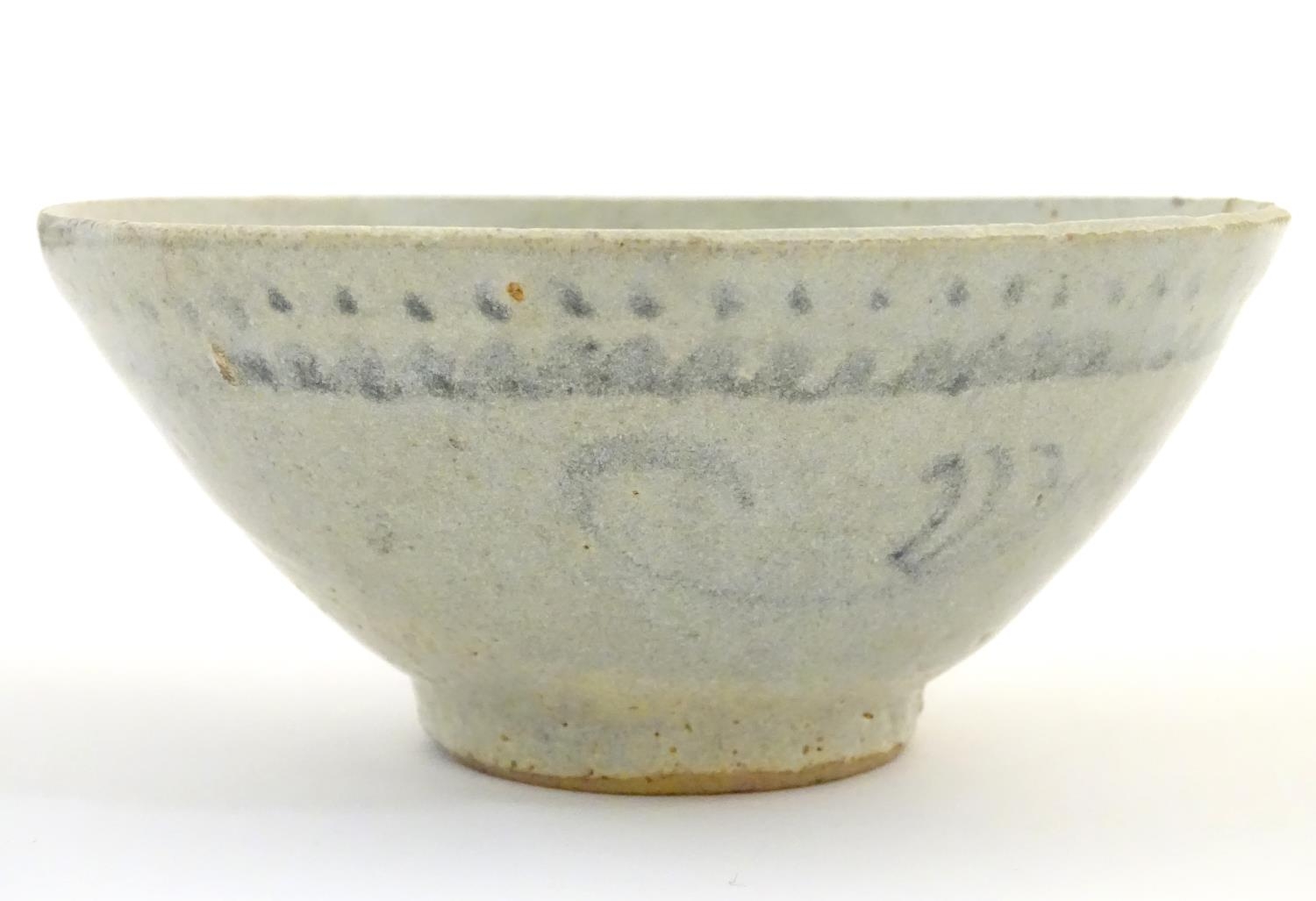 An Oriental earthenware bowl of tapering form with brushwork detail. Approx. 2 1/4" high x 5" - Image 6 of 7