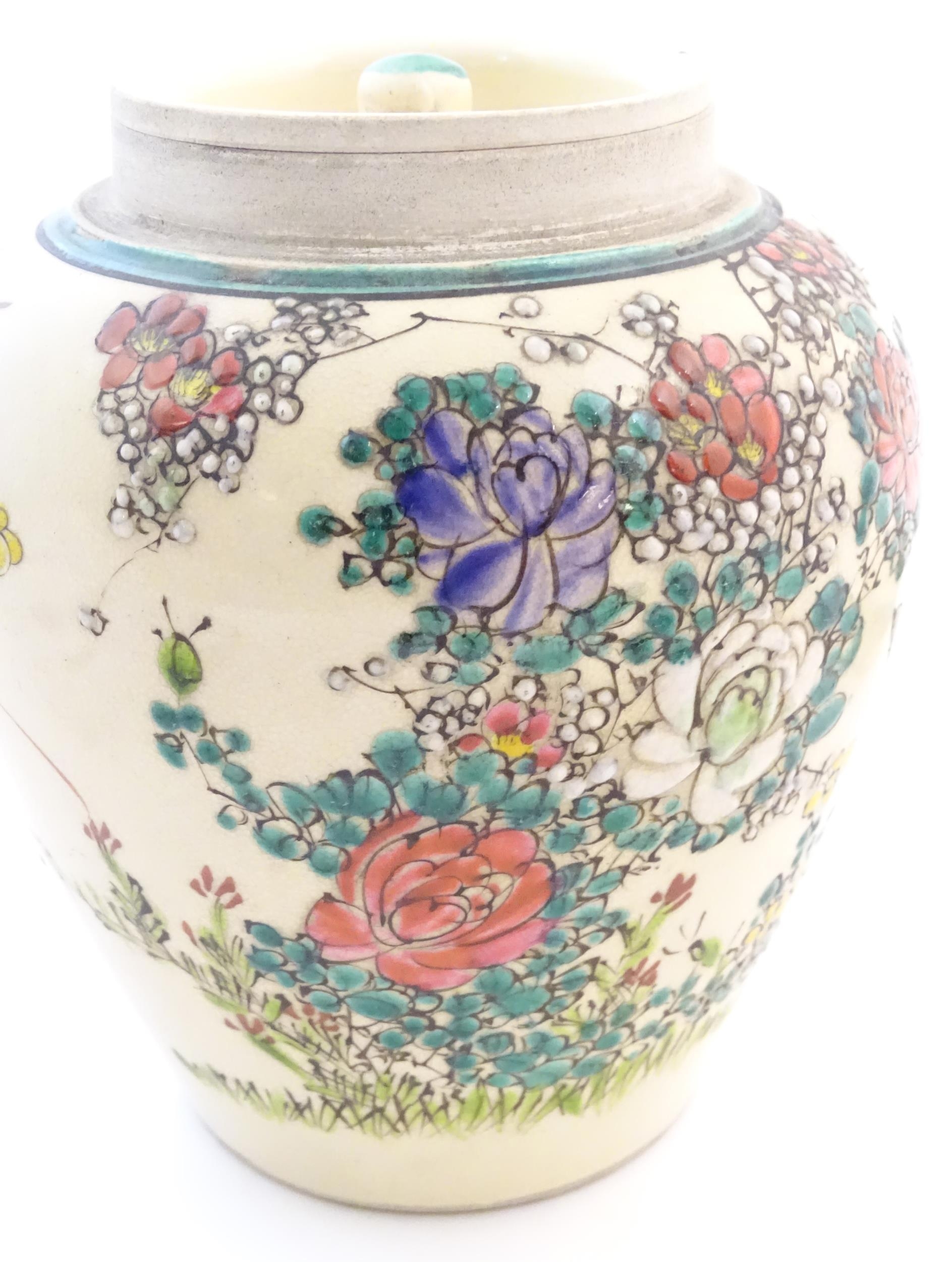 An Oriental ginger jar and cover with inner lid, decorated with flowers and foliage. Possibly - Image 12 of 13