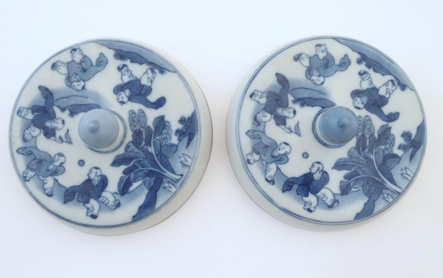 Two Chinese blue and white lids with figures in a landscape. Approx. 6 1/2" diameter (2) Please Note - Image 3 of 5