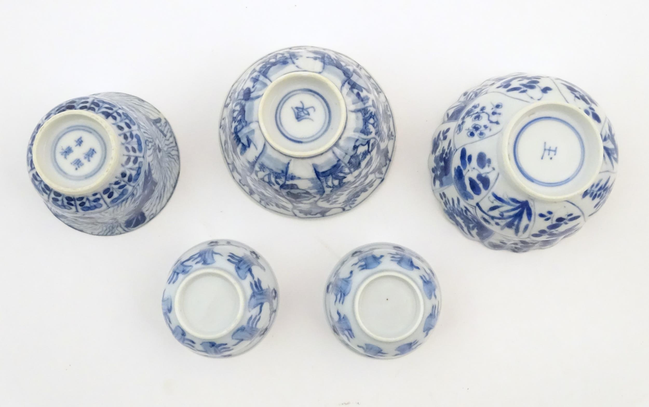 A quantity of assorted Chinese tea bowls, wine cups and saucers. Saucer decoration to include a - Image 7 of 12