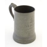 A Victorian pewter tankard by J. Edwards, London, 1 quart (two pints), inscribed with Eton College