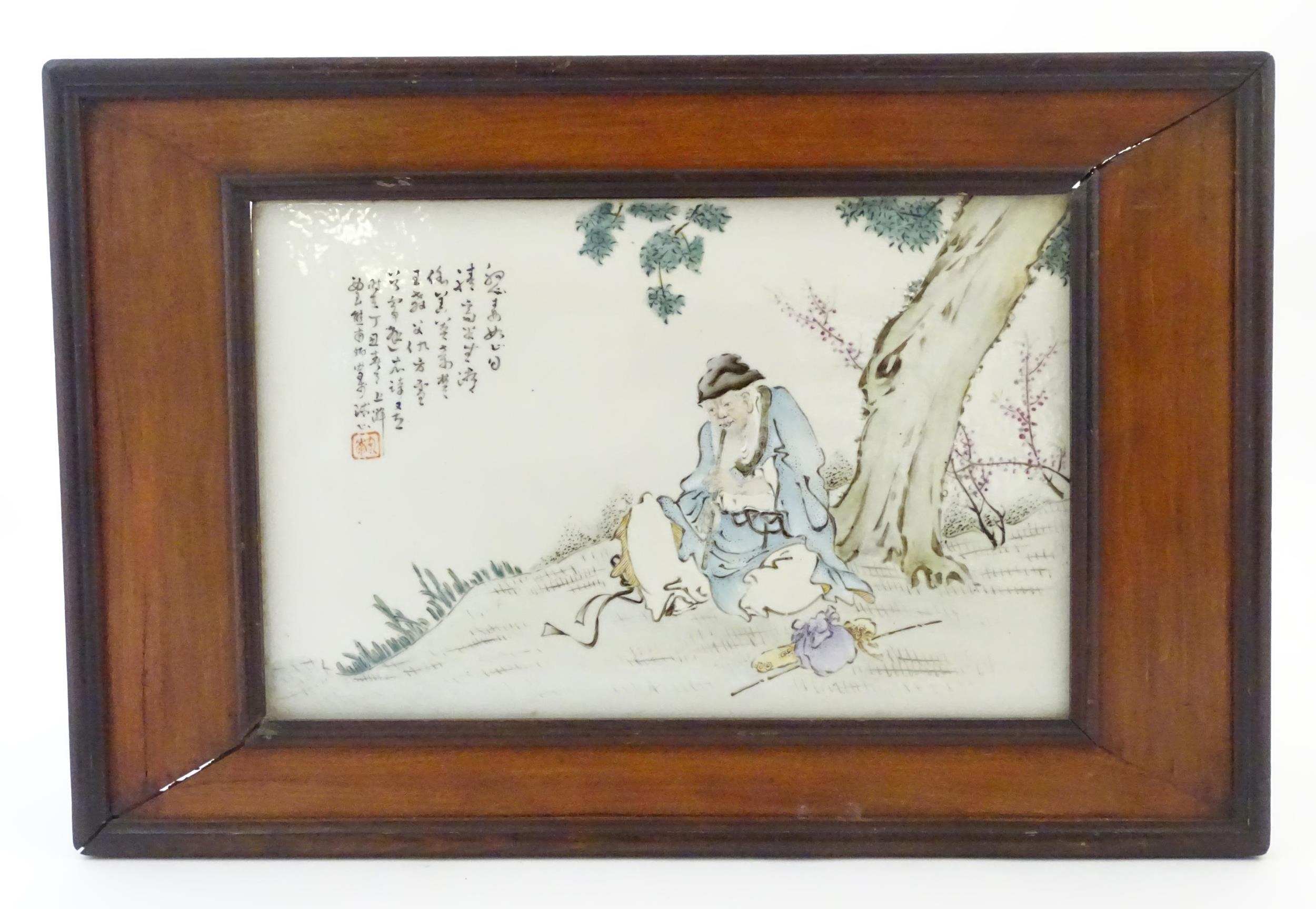 A Chinese porcelain plaque decorated with a seated elder / scholar beneath a tree, with Oriental - Image 3 of 6