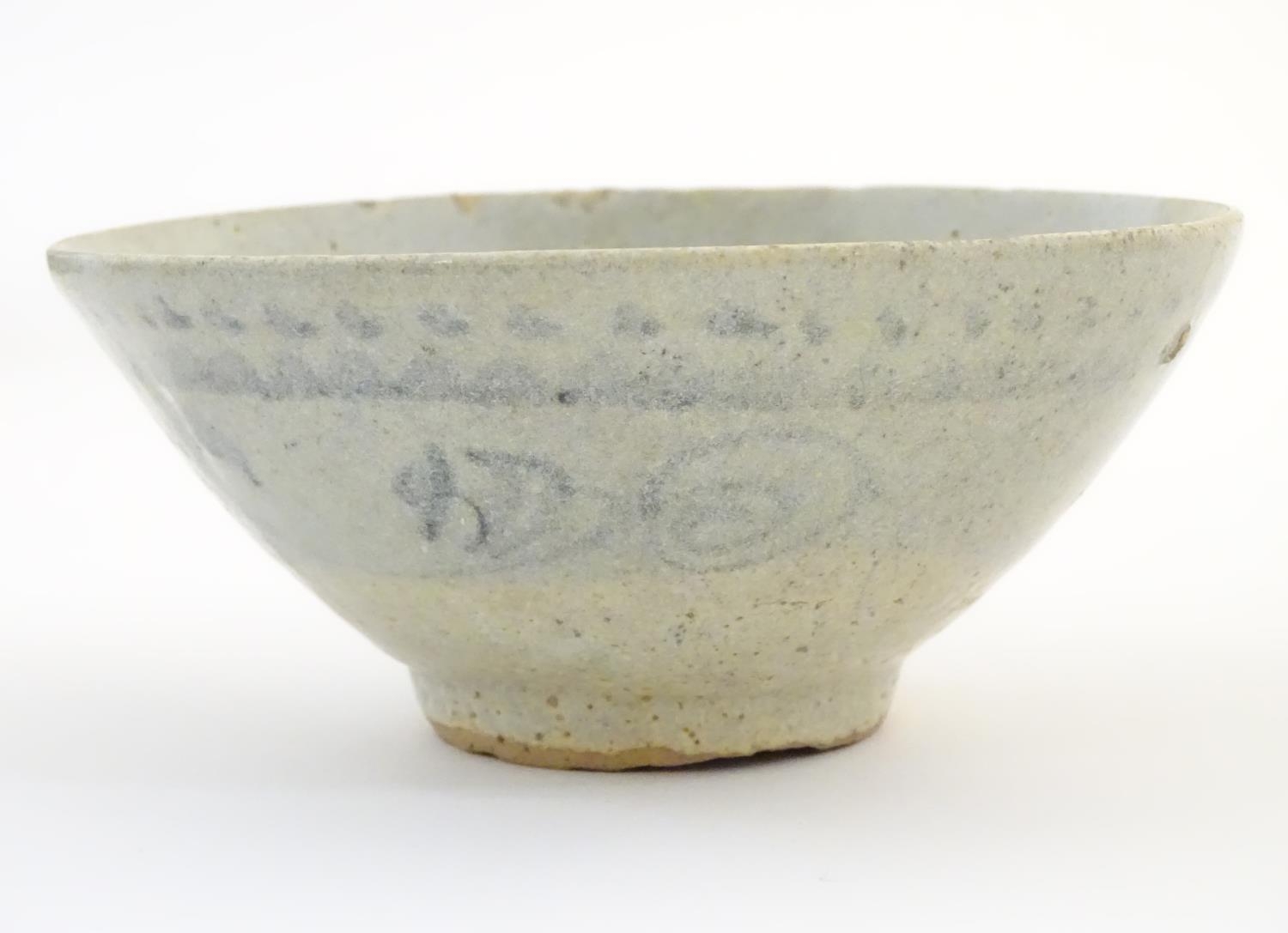 An Oriental earthenware bowl of tapering form with brushwork detail. Approx. 2 1/4" high x 5" - Image 5 of 7