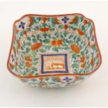 A Minton squared bowl in the Crazy Cow pattern with flowers, foliage and central stylised animal
