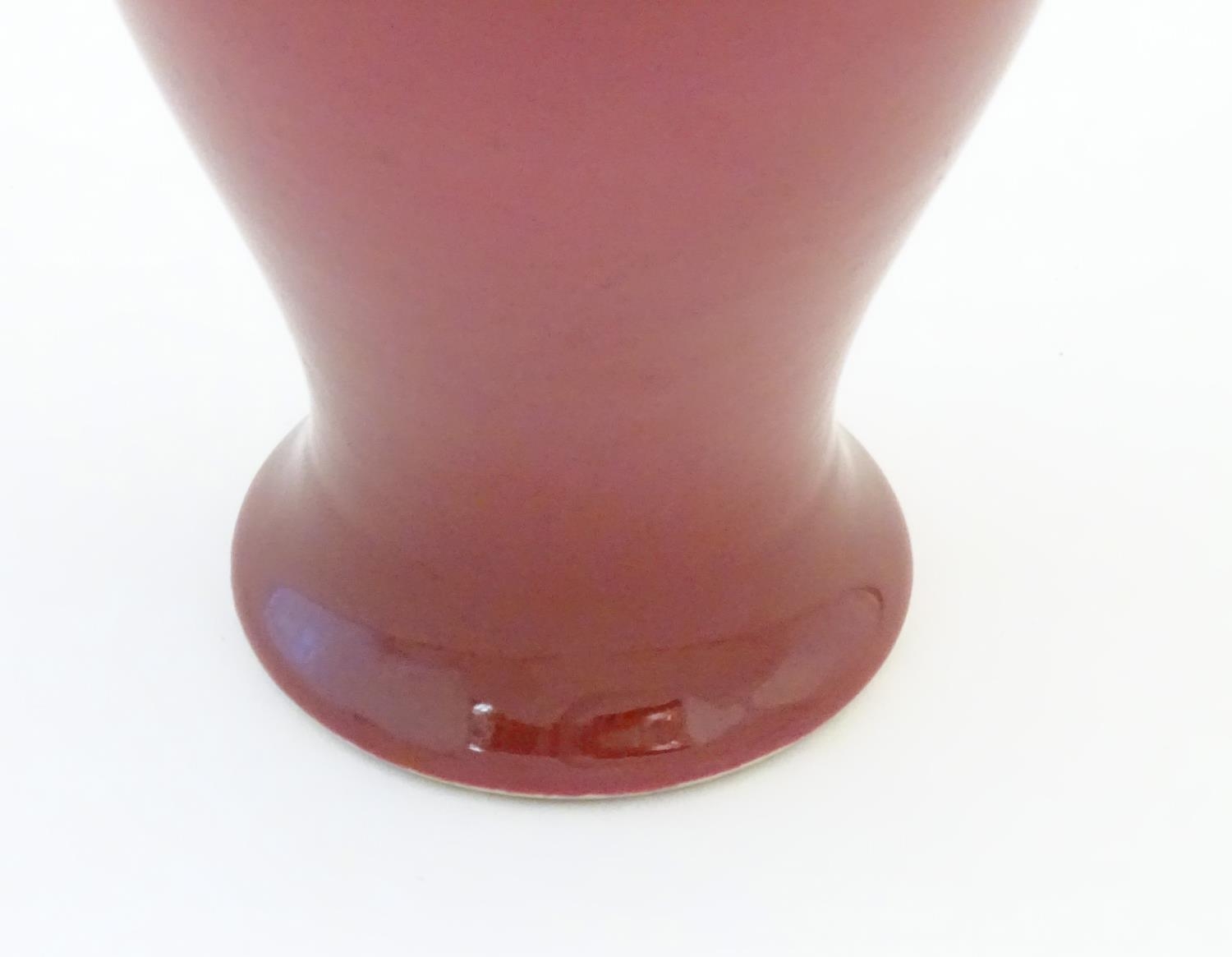 A Chinese baluster vase with a bulbous rim, with a ruby pink glaze and a turquoise interior. - Image 5 of 9