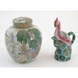 A Chinese ginger jar depicting a wooded river scene with figures on boats, to include men, women,