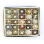 A collection of 25 specimen models of eggs to include rose quartz, red jasper, verdite, fern