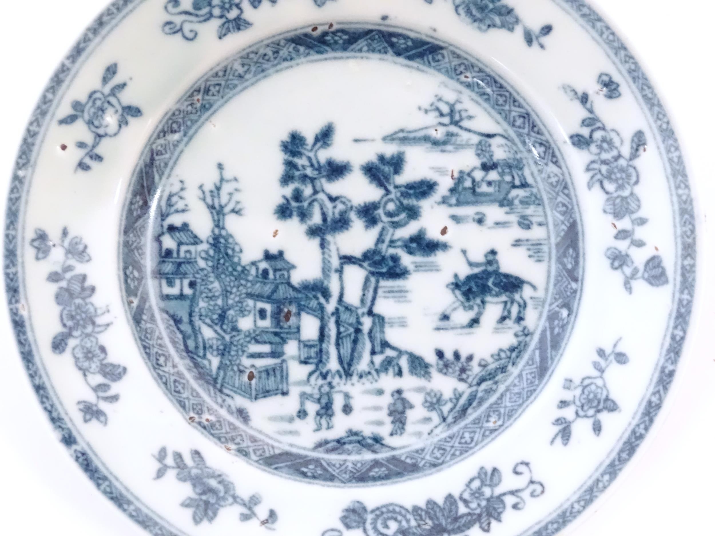 A Chinese blue and white plate depicting a landscape scene with figures, trees, pagodas etc. with - Image 3 of 3