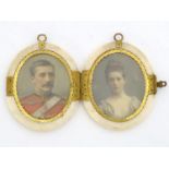A 19thC ivory oval locket / pendant case with double oval portrait photographs within and decorative