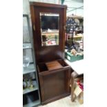 An oak Art Deco hall stand Please Note - we do not make reference to the condition of lots within