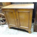 An early - mid 20th oak cupboard Please Note - we do not make reference to the condition of lots