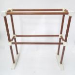 A mahogany towel rail Please Note - we do not make reference to the condition of lots within