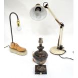 An angle poise lamp together with a silver plated urn formed lamp and another mounted on a shoe