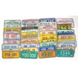 A quantity of novelty miniature American number / license plates for various states to include Utah,