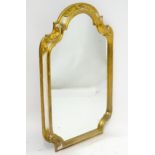 A gilt framed mirror. Approx. 37 1/2" high Please Note - we do not make reference to the condition