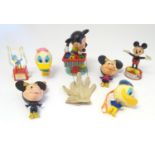 Toy: A quantity of assorted Disney toys to include a Mickey Mouse puppet playing a xylophone, a