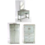 A mid 20thC Art Deco bedroom suite with chromed handles. The suite comprising a wardrobe, dressing