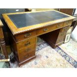 An Edwardian mahogany pedestal desk with inlaid leather top Please Note - we do not make reference