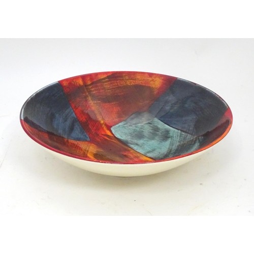 A Poole pottery fruit bowl / charger Please Note - we do not make reference to the condition of lots