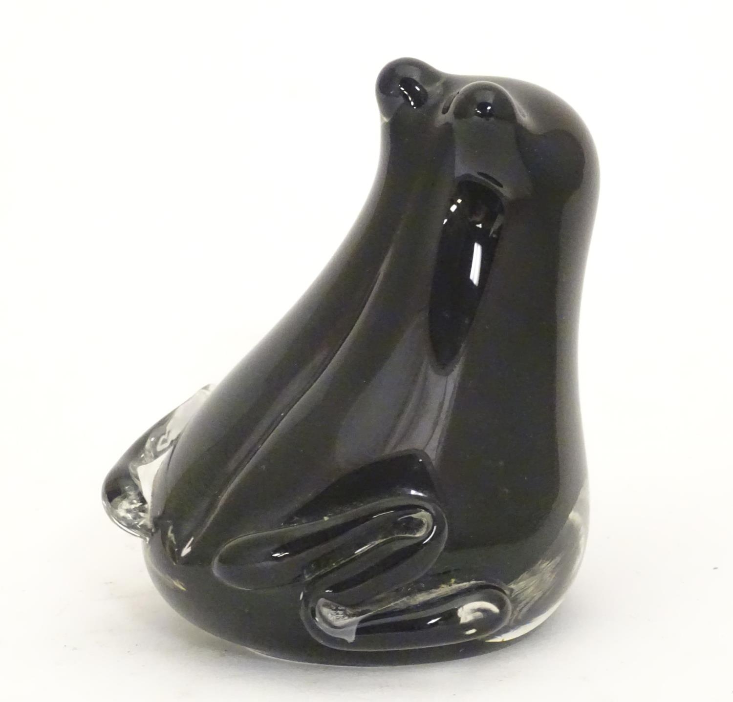 A late 20thC art glass figural ornament formed as a frog, black and clear glass, with label for - Image 5 of 6