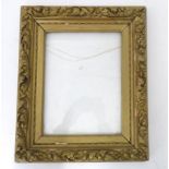 An ornate gilt frame to fit a 12 1/4" x 9 1/4" picture Please Note - we do not make reference to the