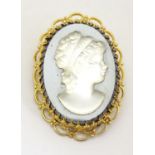Vintage costume jewellery : A Cameo style brooch 1 1/2" long Please Note - we do not make